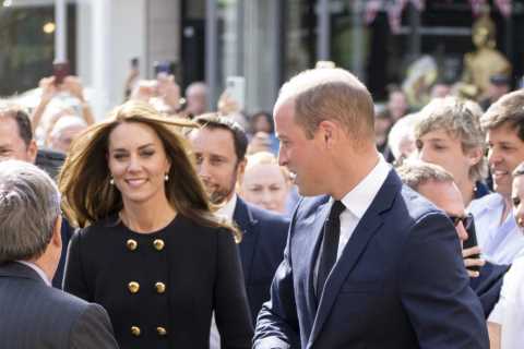Princess Kate and Prince William beam as they meet volunteers who worked at Queen’s funeral