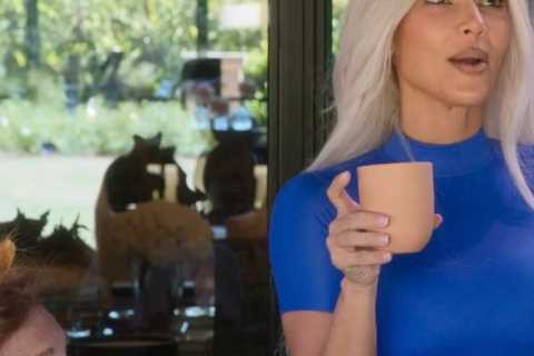 Kim Kardashian shows off her real stomach &amp; curves in a skintight blue two-piece set in..