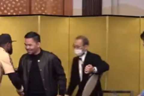 Floyd Mayweather and Manny Pacquiao take playful jabs at each other in press conference ahead of..