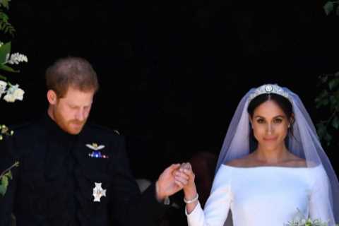 The Queen was ‘surprised’ that divorcee Meghan Markle wanted to wear a pure white wedding dress,..