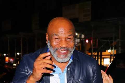 Mike Tyson, 56, in good spirits while out for dinner with woman after struggling to walk or talk..