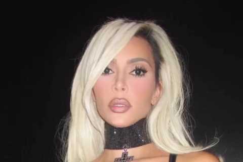 Kim Kardashian nearly busts out of tiny bra &amp; flaunts giant choker in new video at Dolce &amp;..