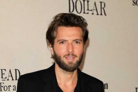 Hollyoaks star Guy Burnet unrecognisable 14 years after shock exit as he walks the red carpet at..