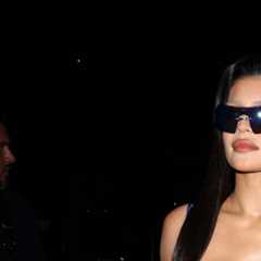 Kylie Jenner almost busts out of tight blue dress & shows off her long legs on Paris outing in..