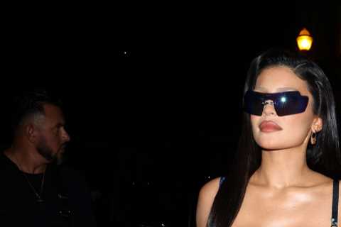 Kylie Jenner almost busts out of tight blue dress & shows off her long legs on Paris outing in..