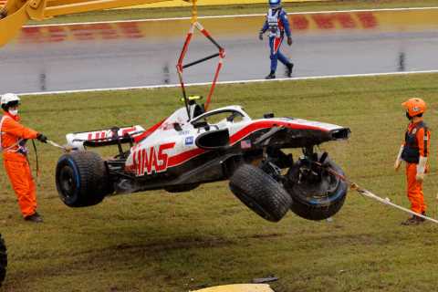 Watch as Mick Schumacher CRASHES out of Japanese GP practice and destroys car as torrential rain..