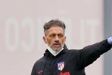 Former Arsenal star looks unrecognisable as silver-haired fox working as assistant manager for..