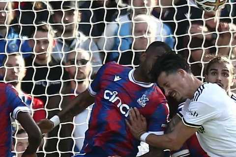 Crystal Palace ace Jordan Ayew plays on with five stitches and bloodied headband after sickening..
