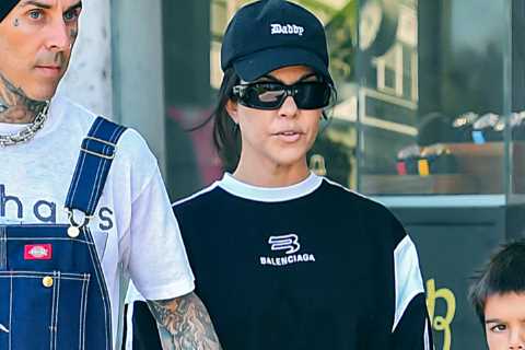 Kourtney Kardashian drowns her frame in baggy T-shirt on day out with Travis Barker and Reign, 7,..