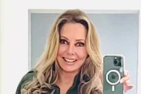 Carol Vorderman looks incredible in khaki jumpsuit and sexy boots after opening up about dating..