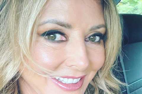 Carol Vorderman reveals incredible figure in low cut tartan dress at Ascot