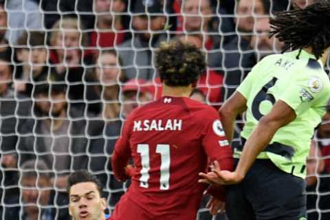 Watch Ederson pull off one of saves of season as he narrowly tips Mo Salah’s shot around post in..