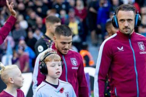 Aston Villa star Danny Ings shows his class by wearing noise-cancelling headphones like mascot for..