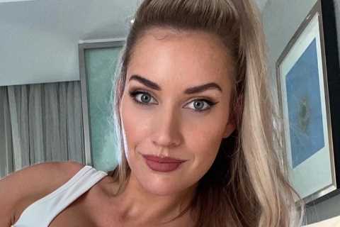 Paige Spiranac wows in white bodysuit and replies to fan who spots lack of wedding ring with John..