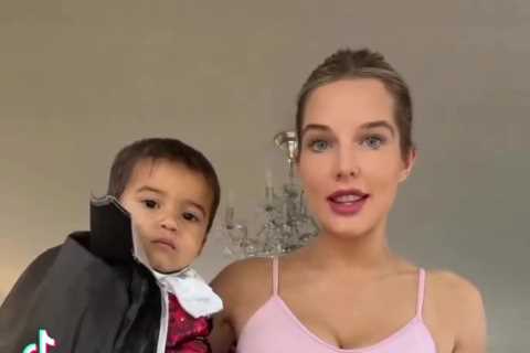 Newly-single Helen Flanagan shows off her abs in a crop top and leggings in sweet Halloween video..