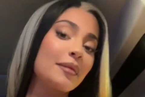 Kylie Jenner shows off major cleavage &amp; her famous curves in a very low-cut top for new..