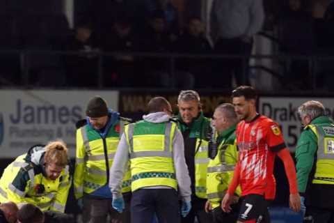 Luton star Sonny Bradley involved in sickening collision and given oxygen before being stretchered..