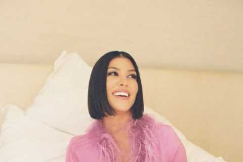 Kourtney Kardashian covers tummy with feathers for new Lemme ad as fans think star is pregnant with ..