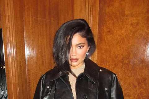 Kylie Jenner shows off bare legs in mini dress &amp; leather jacket after she shares secret..