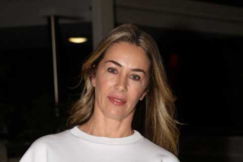 Chris Moyles’ girlfriend opens up on what he’s really like off camera as she arrives at Brisbane..