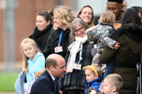 Prince of Wales hugs little boy and vows to put his picture on the royal fridge