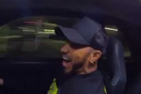 Formula 1 star Lewis Hamilton slammed for doing doughnuts in a £155,000 Nissan Skyline supercar in..