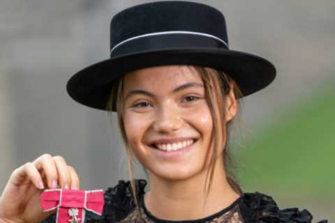 Beaming Emma Raducanu receives MBE from King Charles III for services to tennis following..