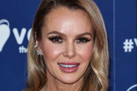Amanda Holden shows off her HUGE Christmas tree as daughter Hollie decorates