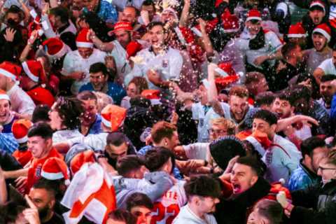 England fans nurse sore heads after celebrating 3-0 victory against Senegal – as Three Lions head..