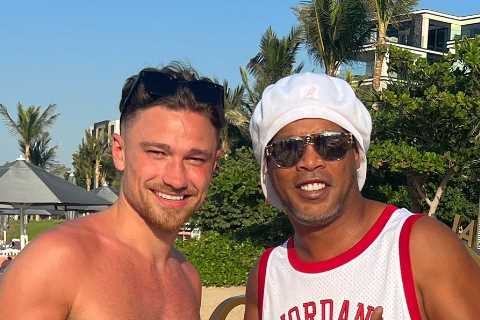 Sunburnt Matty Cash bumps into Ronaldinho in Qatar after Poland’s World Cup 2022 exit to France