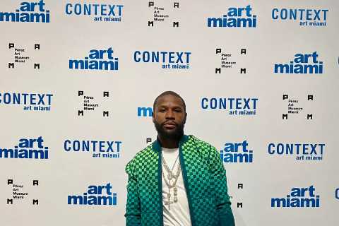 Floyd Mayweather rocks £3,200 reversible Louis Vuitton outfit with matching bag at art exhibition..