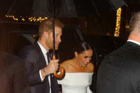 Meghan Markle wears strapless white dress to accept ‘anti-racism’ award with suited Prince Harry..