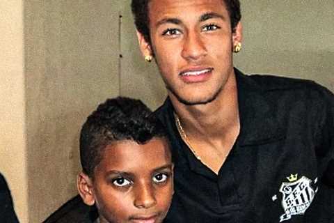 Brazil World Cup star looks unrecognisable as young hopeful posing with idol Neymar when he was at..