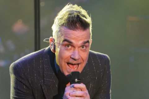 England stars treated to surprise live gig by Robbie Williams as part of preparation for World Cup..
