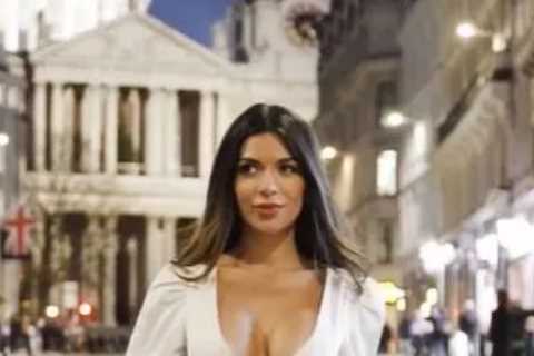 Love Island winner Ekin-Su stuns in very low cut white dress despite sub zero temperatures in London