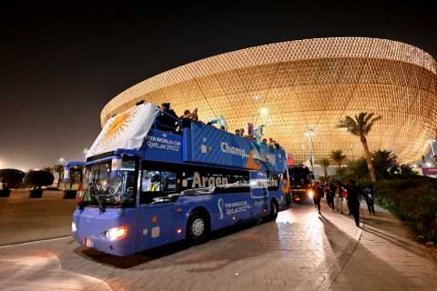 Argentina stars get party started early with open top bus parade in Qatar with World Cup before..