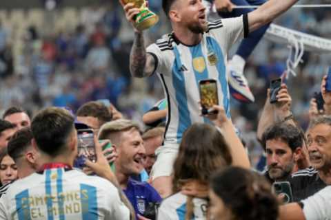 Lionel Messi, Angel Di Maria and Emi Martinez pose with World Cup trophy on flight back to Buenos..
