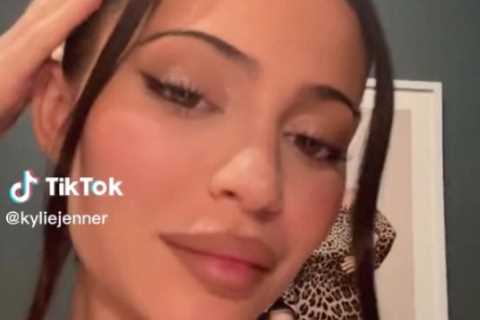 Kylie Jenner slammed for ‘ridiculous’ lips as star busts out of black bra in sexy TikTok video