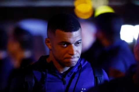 Kylian Mbappe dejected as France squad arrive back in Paris after World Cup final heartbreak..