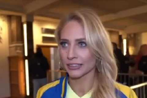 Watch Ebanie Bridges leave presenter stunned as boxer flashes boobs mid-interview after OnlyFans..