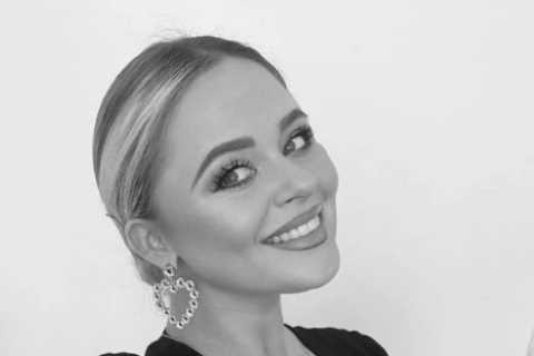 Emily Atack looks incredible as she poses in low-cut dress on Christmas Day