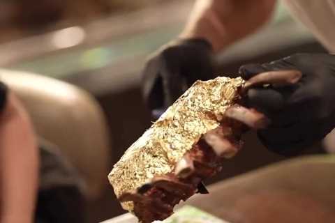 Cringeworthy moment Salt Bae drips juice from steak on customer’s phone as followers brand latest..