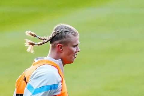 ‘Viking mode activated’ – Erling Haaland shows off new pigtails hairstyle as Man City prepare for..