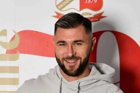 Charlie Austin, 33, completes free transfer to Swindon Town as he rejoins old club two weeks after..