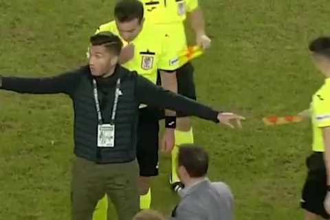 Watch astonishing moment ex-Liverpool star Nuri Sahin rushes to protect referee from his OWN..