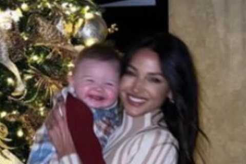 Michelle Keegan looks sensational as she cuddles up to baby nephew in unseen snaps from Christmas