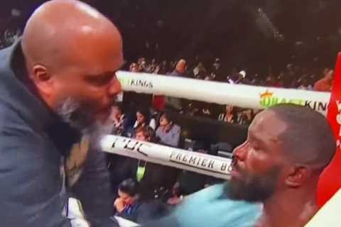 Watch boxer Demond Nicholson get repeatedly SLAPPED in corner by coach during heavy points loss to..
