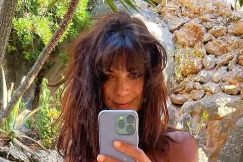 Jenny Powell, 54, looks incredible as she strips off to an orange bikini on holiday