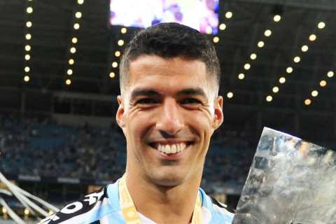 Luis Suarez scores incredible 38 minute hat-trick on Gremio debut as ex-Liverpool hero nets..