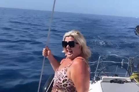 Gemma Collins dances in a leopard print one piece on a yacht in throwback joking she’s ‘auditioning ..